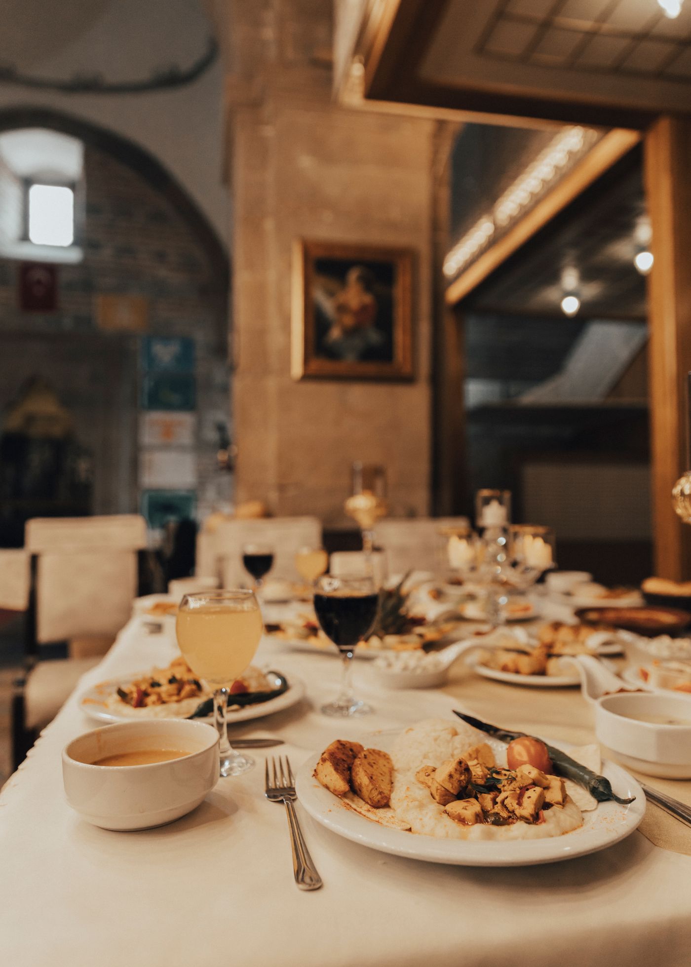 Warm restaurant table with food